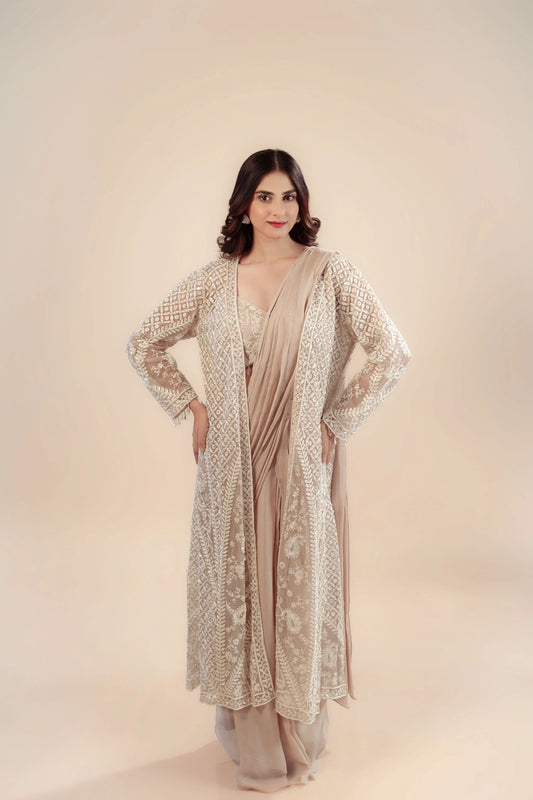 Heavy Embroidered Light Peach with Hand Detailing a Long Jacket With Bustier And Drape Saree Set