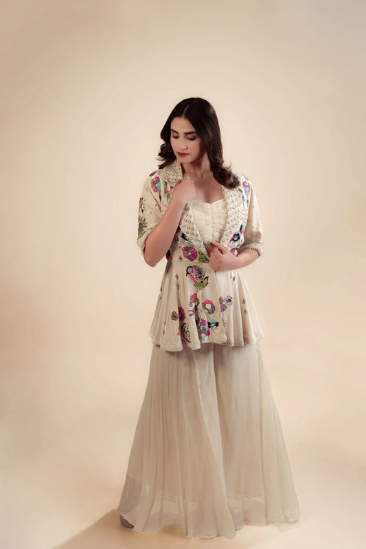 Hand Embroidery Ivory Peplum Top With Bustier And Flared Bottom